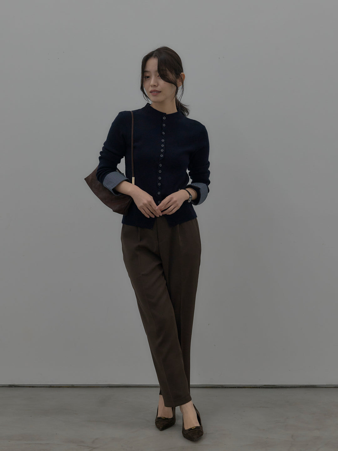 異素材ドッキングデザインボタンニットトップス