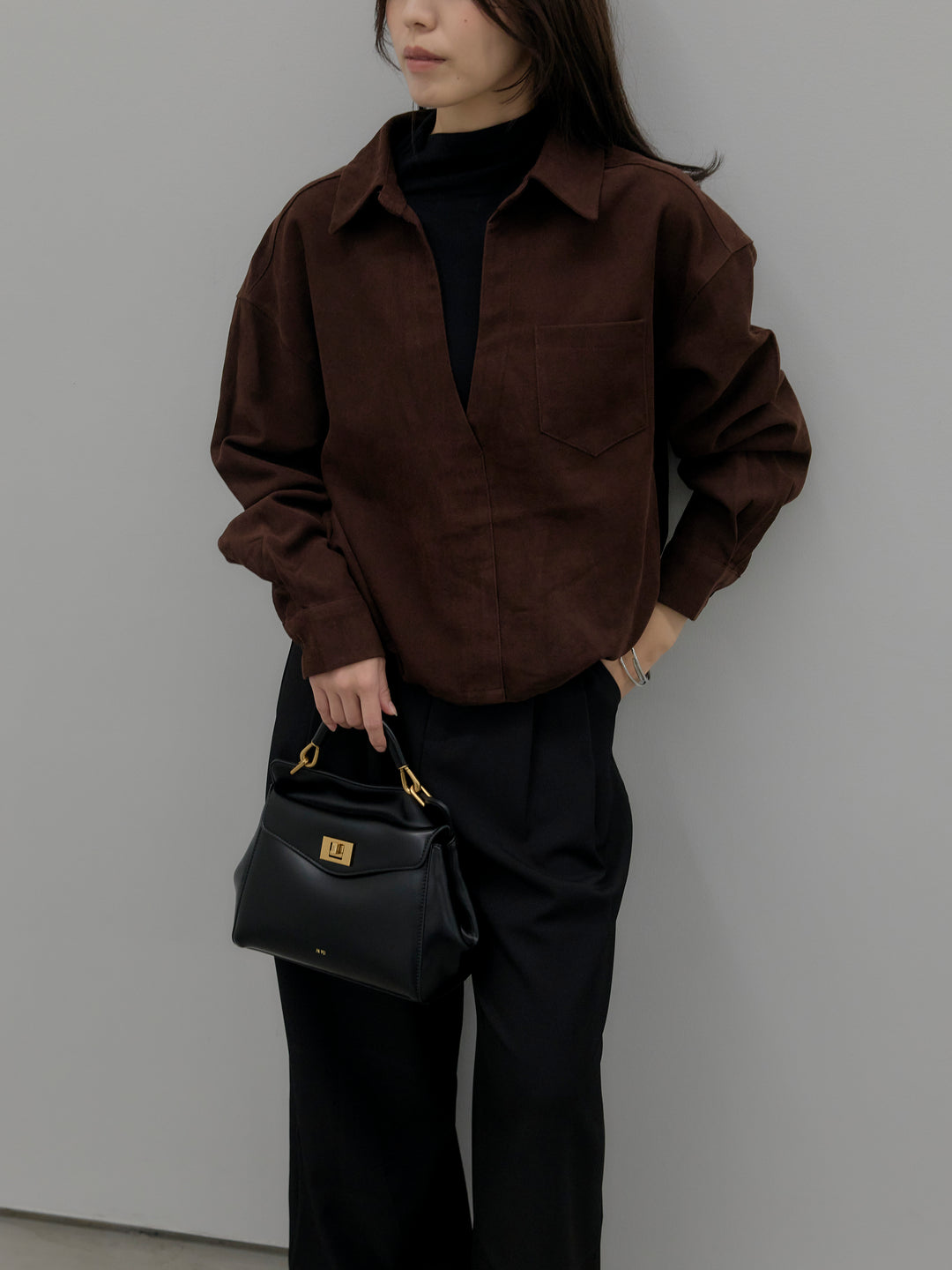 ドッキングデザイン裾ドロストスエードシャツ