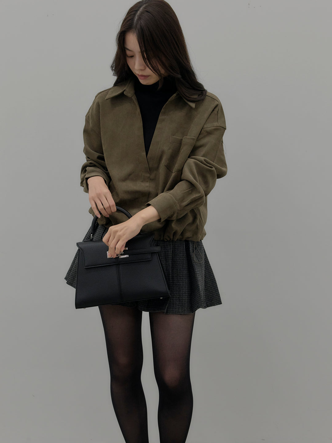 ドッキングデザイン裾ドロストスエードシャツ