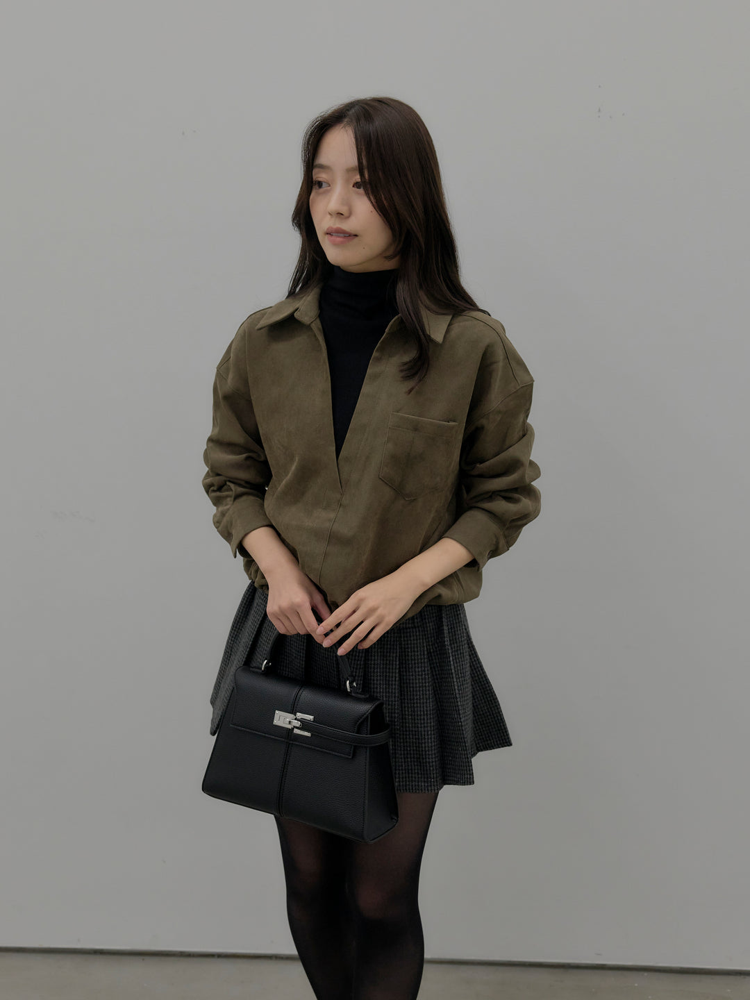 ドッキングデザイン裾ドロストスエードシャツ