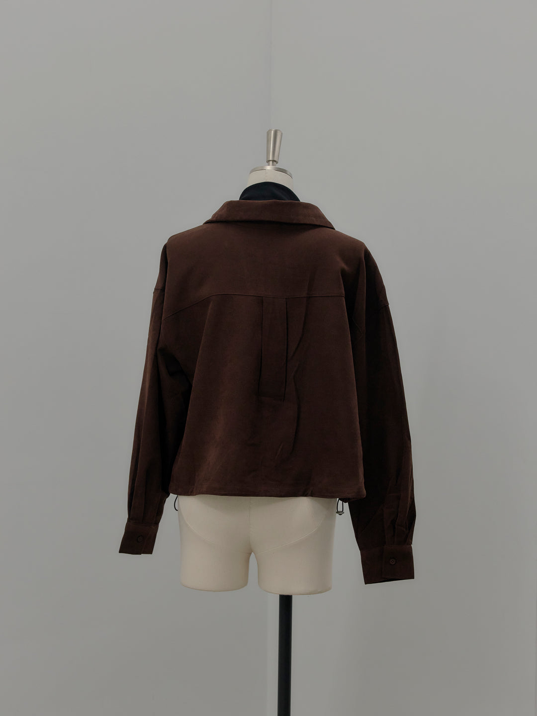 ドッキングデザイン裾ドロストスエードシャツ