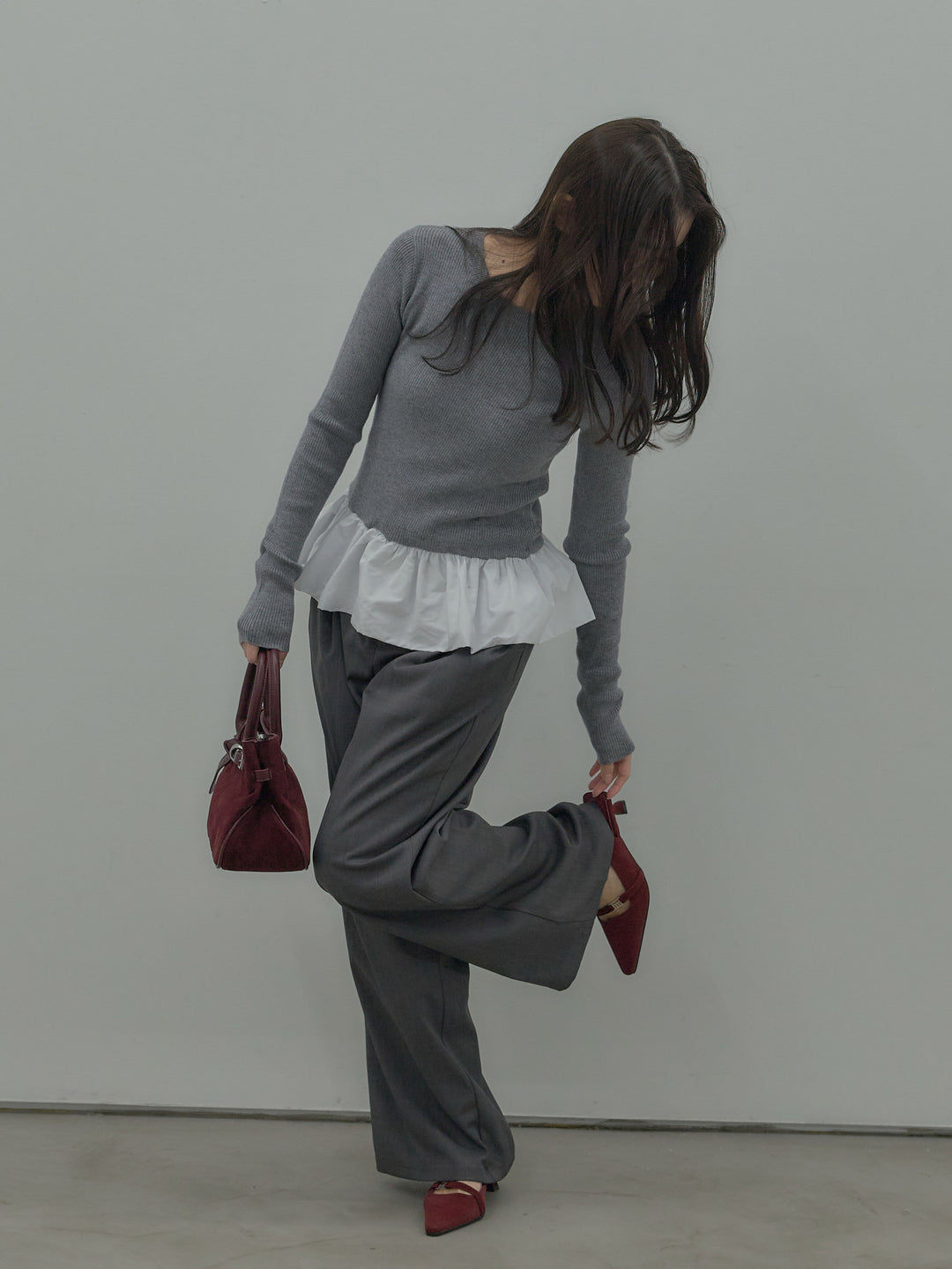 裾ドッキングデザインニットトップス