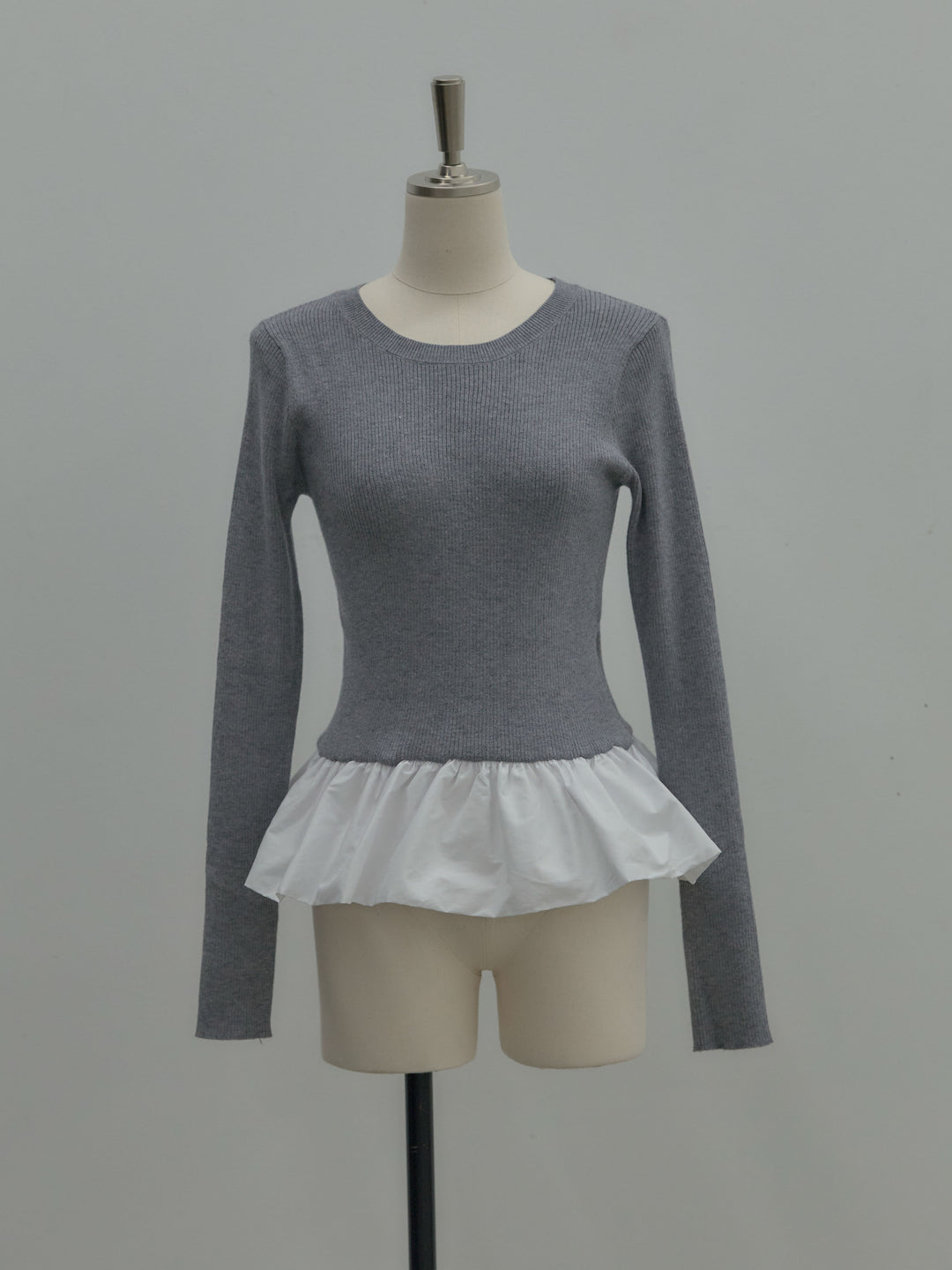 裾ドッキングデザインニットトップス
