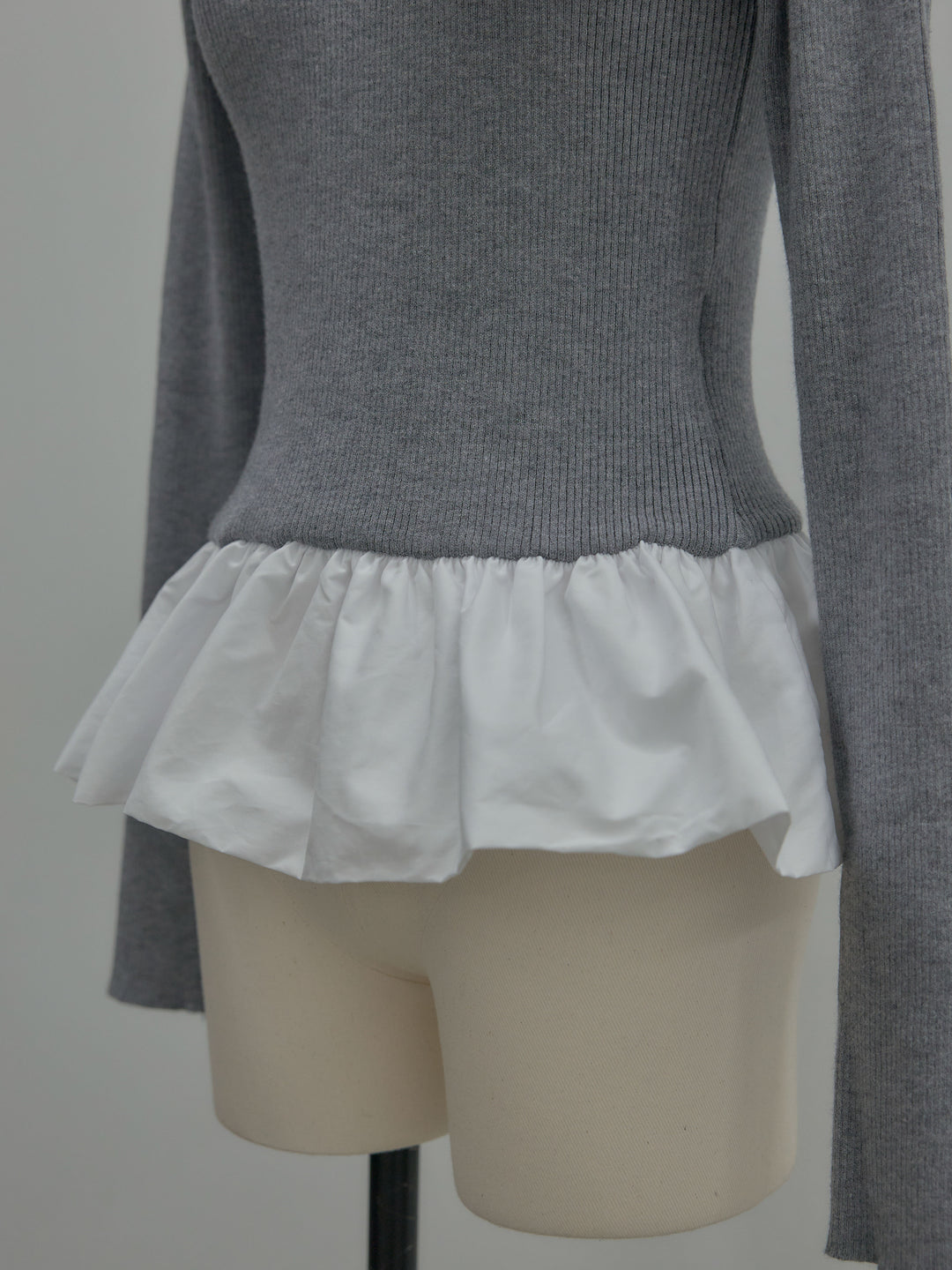 裾ドッキングデザインニットトップス