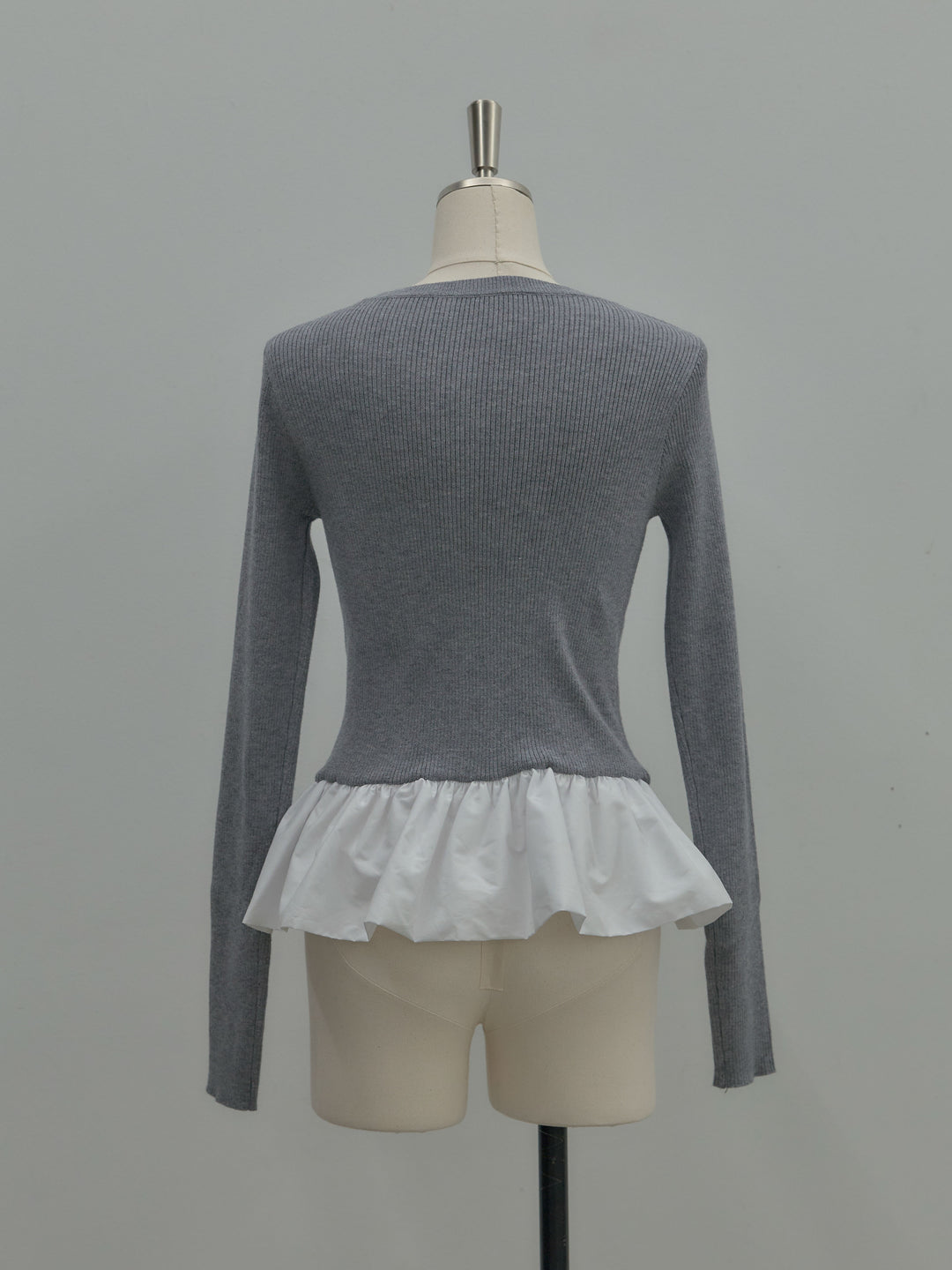 裾ドッキングデザインニットトップス