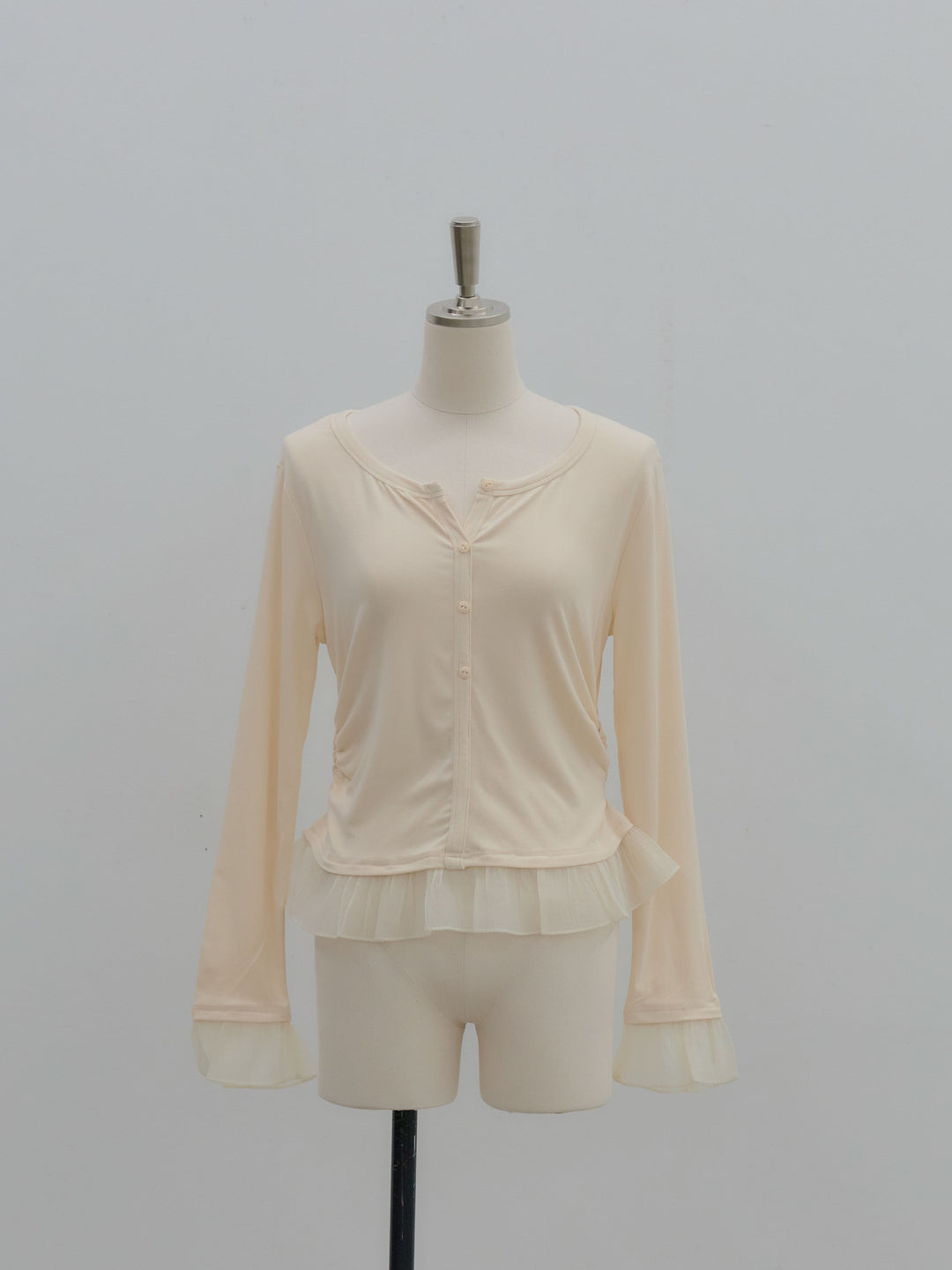 裾フリルヘンリーネックカットソー