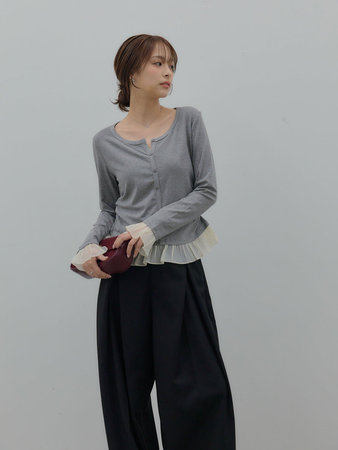 裾フリルヘンリーネックカットソー
