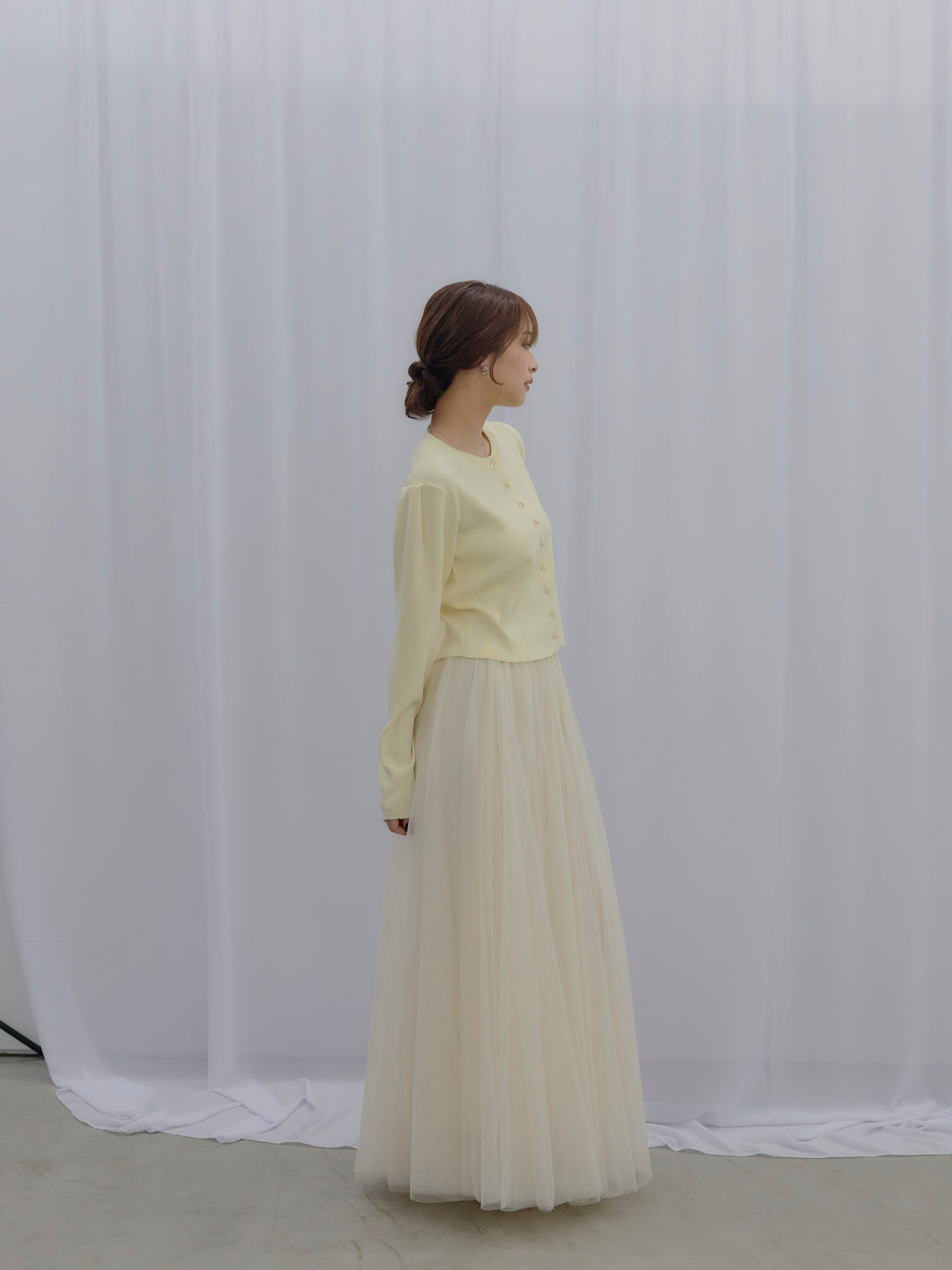 クリアボタンニットカーディガン