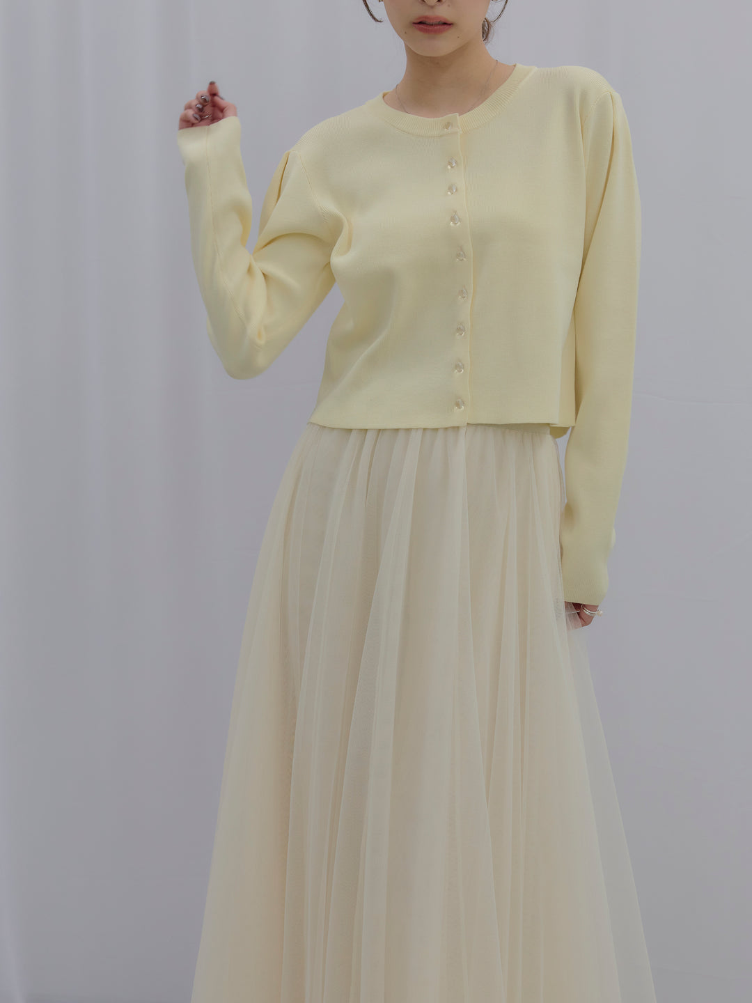 クリアボタンニットカーディガン