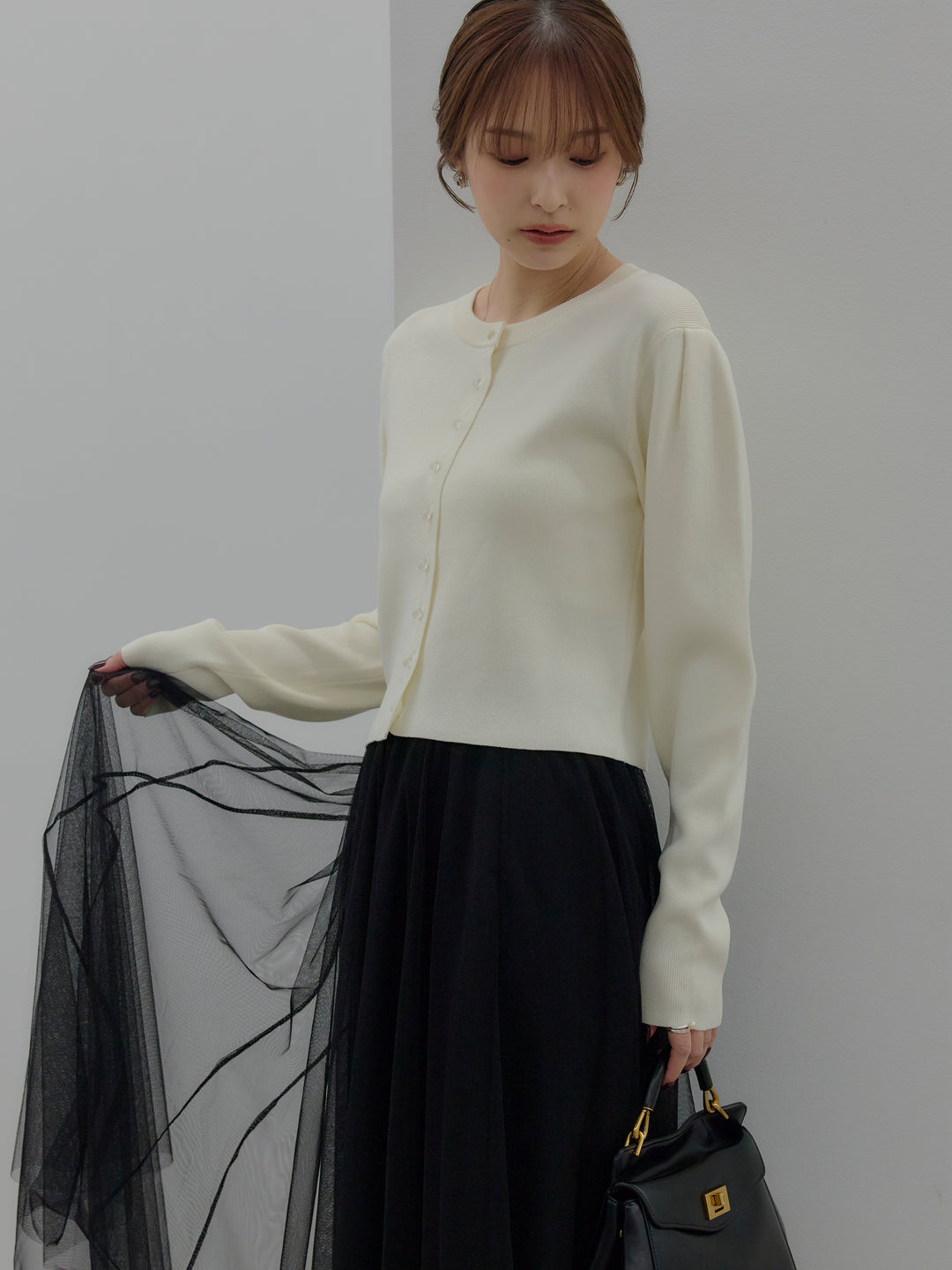 クリアボタンニットカーディガン