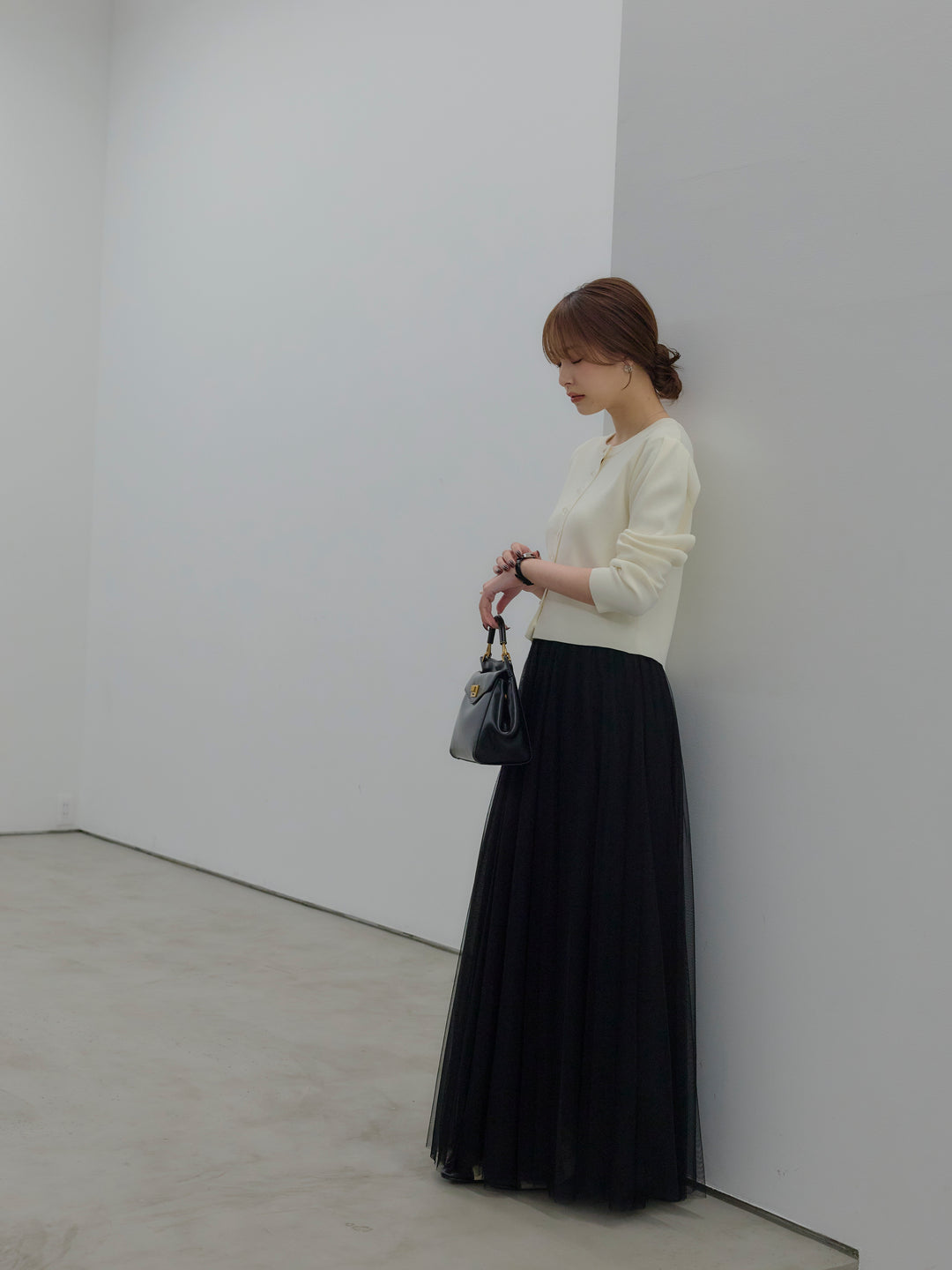 クリアボタンニットカーディガン