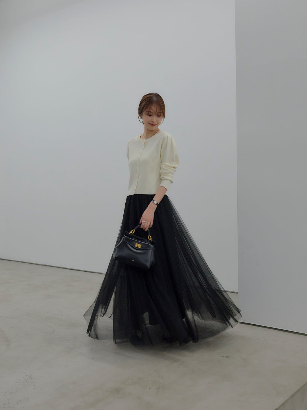 クリアボタンニットカーディガン