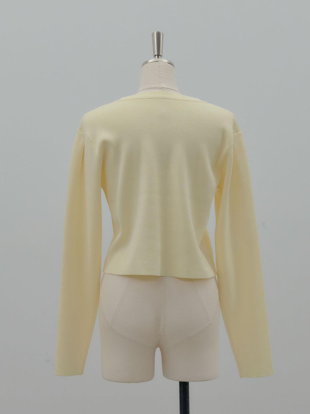 クリアボタンニットカーディガン