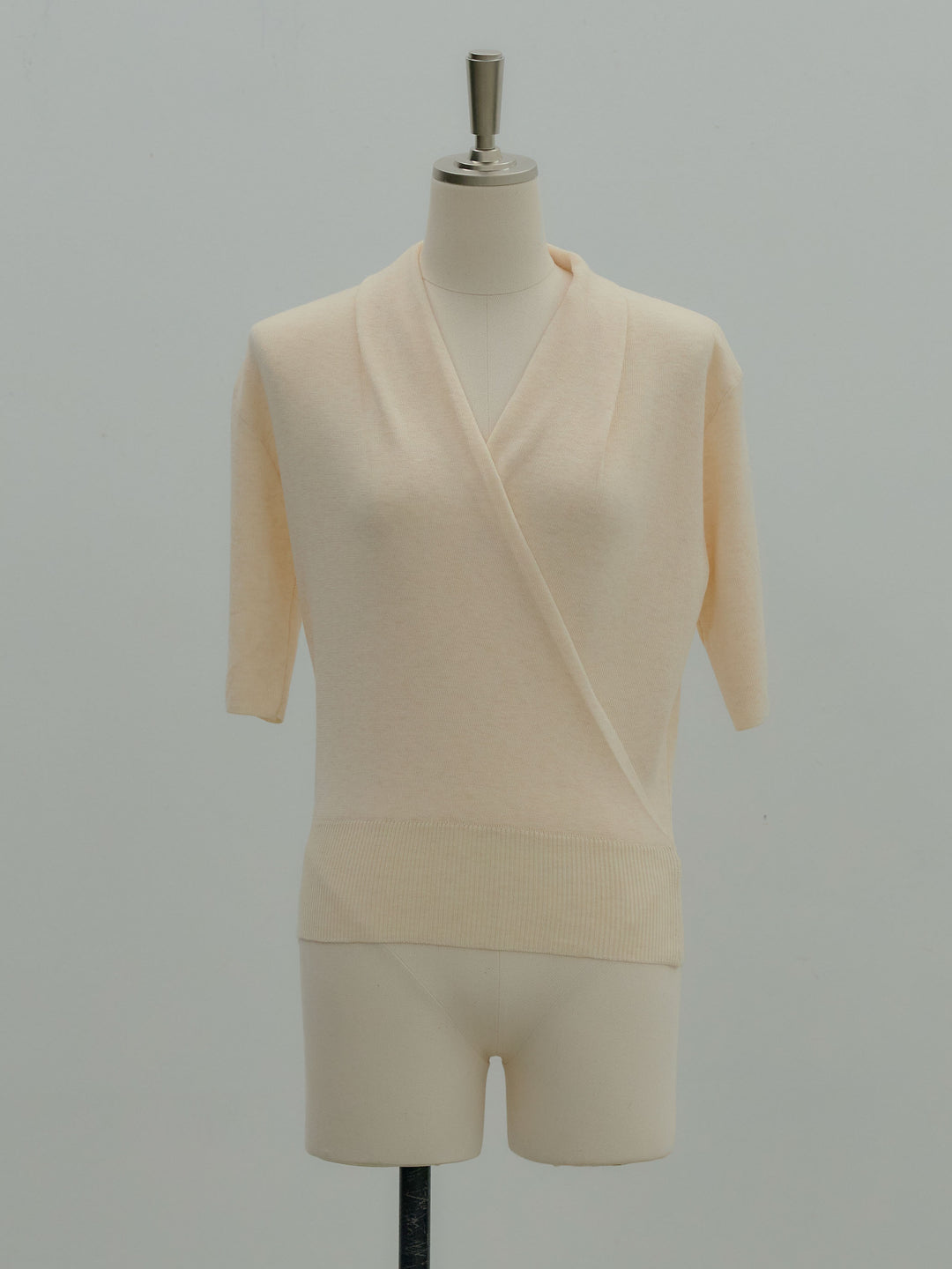 フロントクロスデザインニットトップス