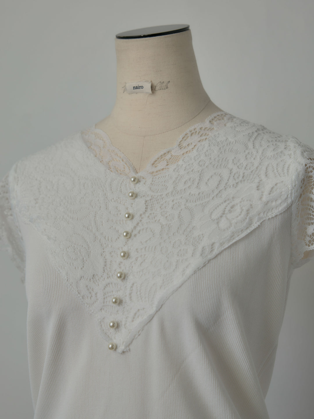 パールボタンレース切替ニットTシャツ