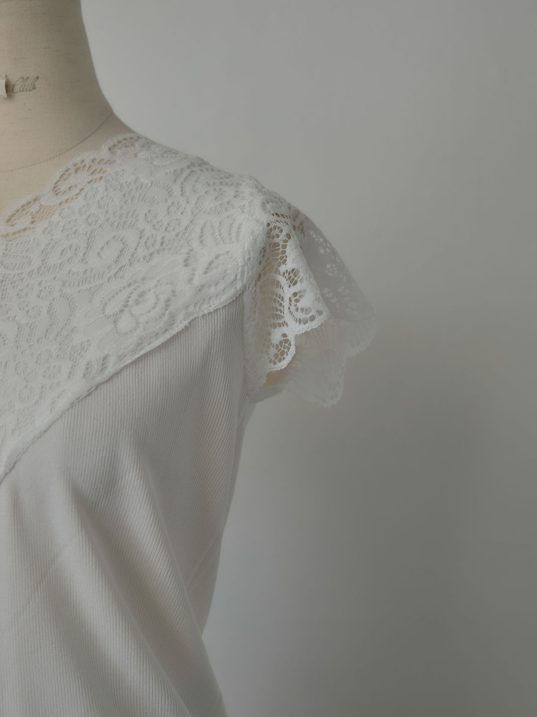 パールボタンレース切替ニットTシャツ