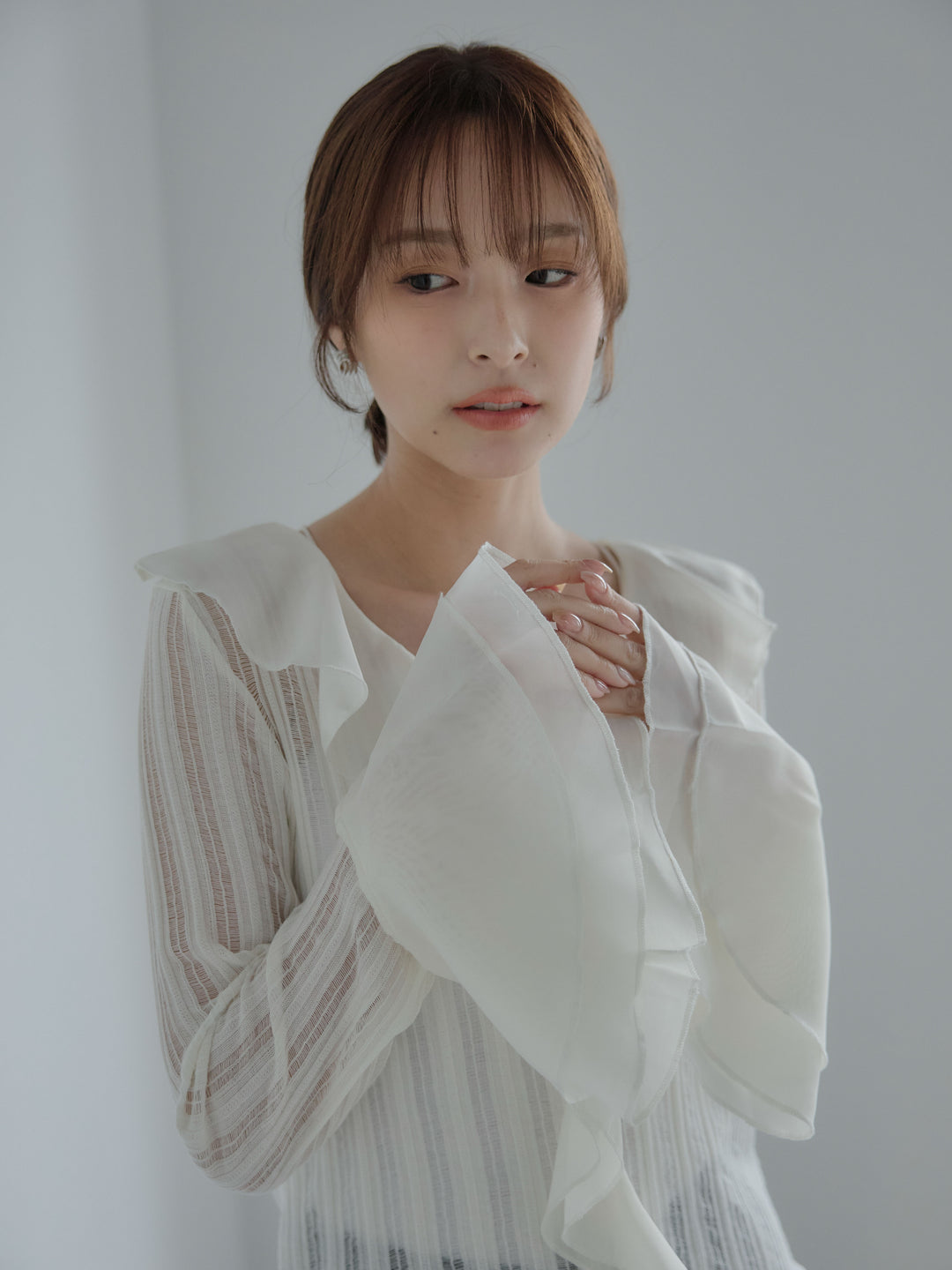 ストライプシアーラッフルトップス