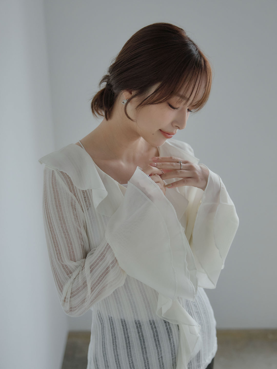 ストライプシアーラッフルトップス