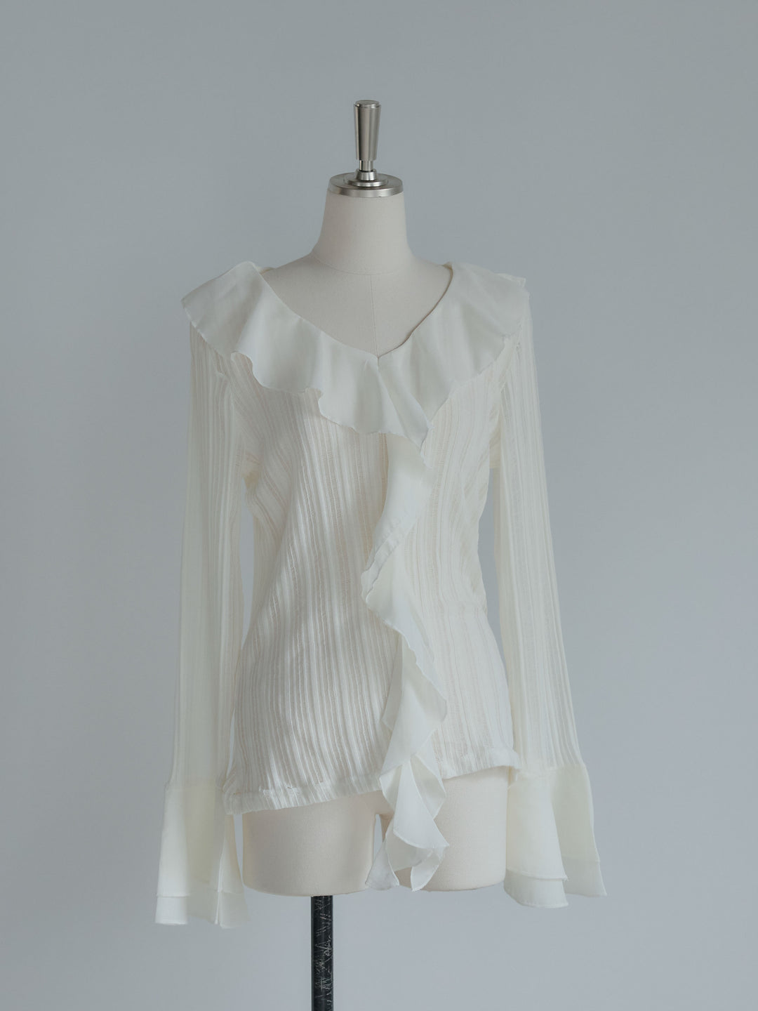 ストライプシアーラッフルトップス