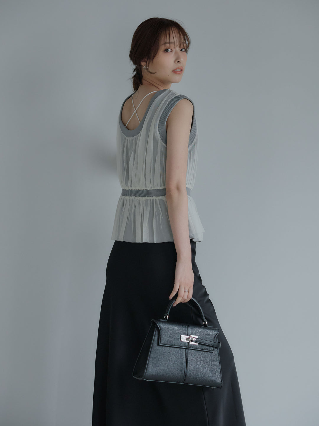 チュールドッキングペプラムトップス