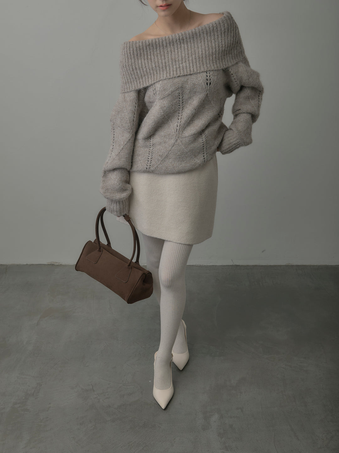 メランジニットオフショルトップス