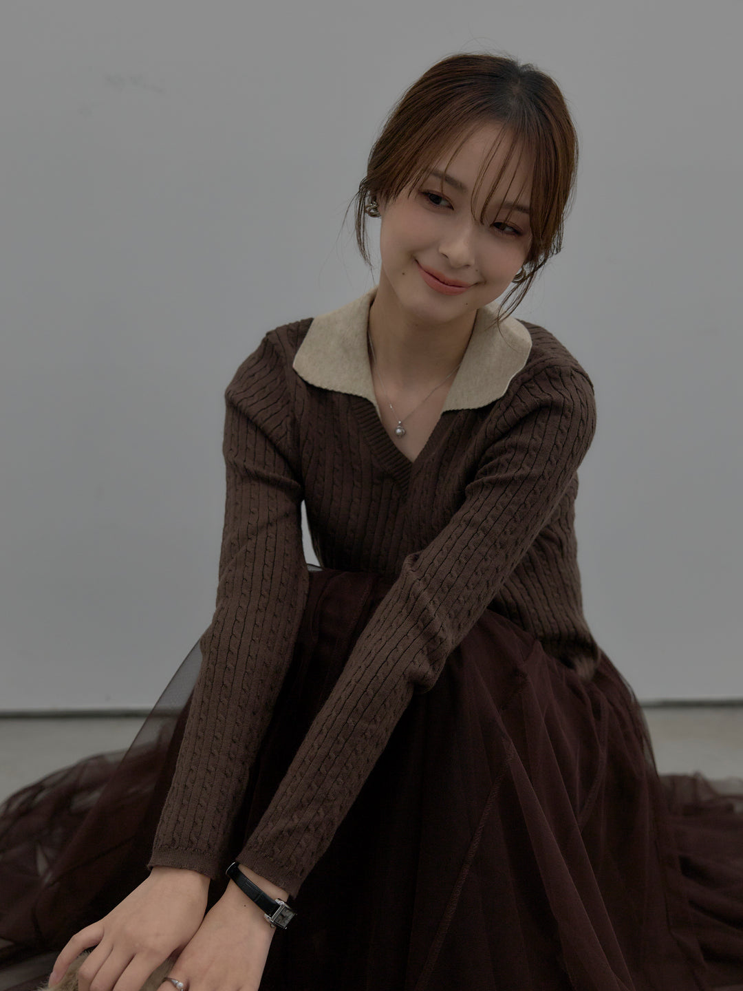 配色Vネックケーブルニットトップス