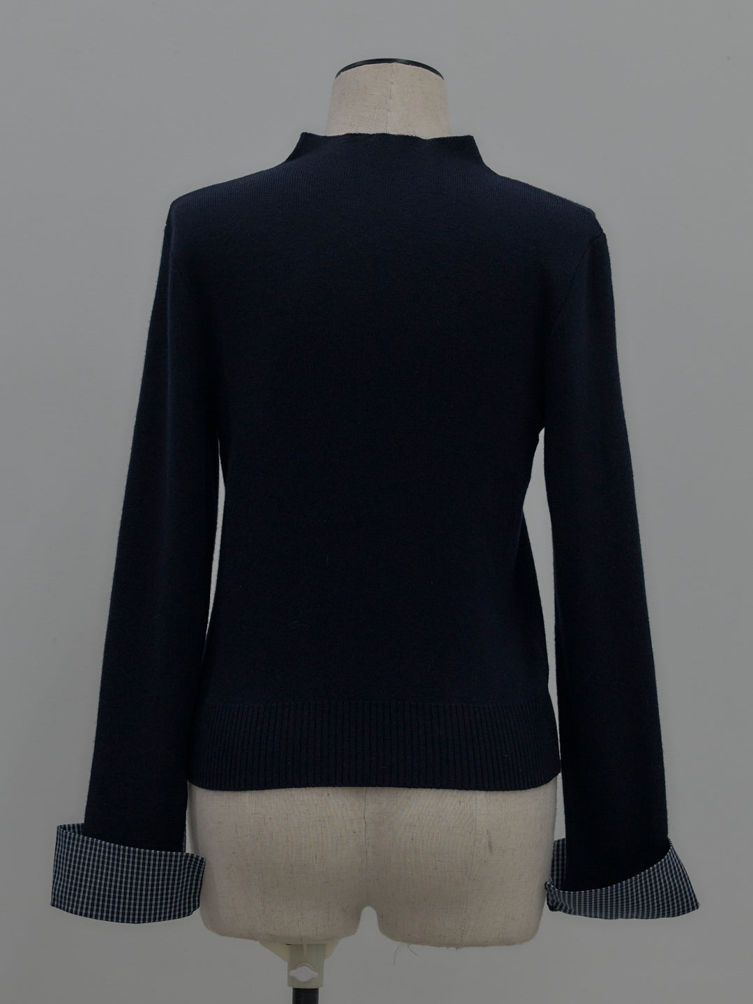 異素材ドッキングデザインボタンニットトップス