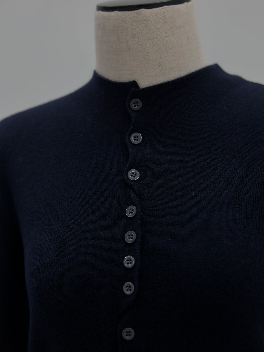 異素材ドッキングデザインボタンニットトップス